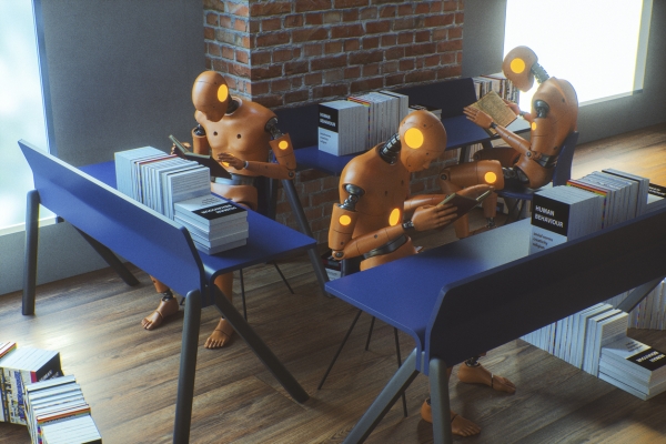 Three robotic forms sat at desks reading manuals on human behaviour
