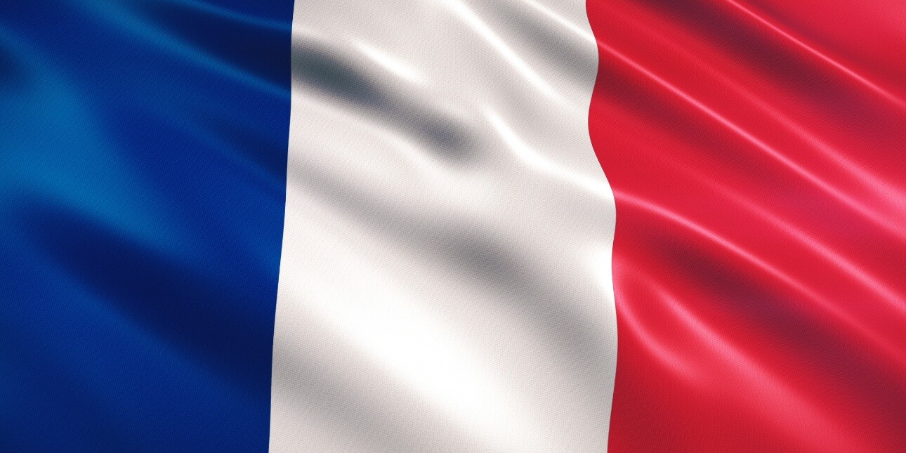 A bird's eye view of the French flag consisting of blue, white and red verticals.