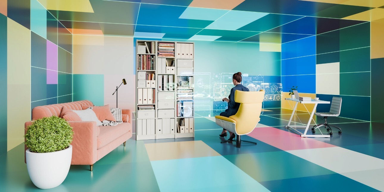 A computer generated image of a futuristic room with multi-colour floor and ceiling tiles, a woman in a yellow chair using a hologram screen, and other more contemporary furniture