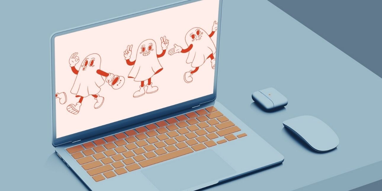 A two-tone blue illustration of a laptop on a desk. The display on the screen shows cartoon illustration of three cheeky looking ghost, outlined in red on a pink background.