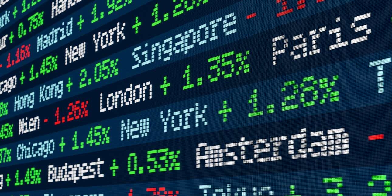 A digital screen showing stock market data for different countries stock exchanges.