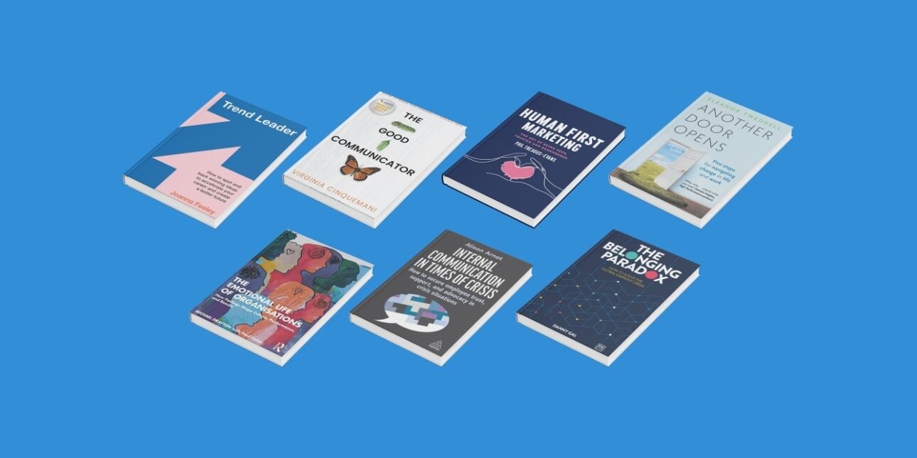 Seven books covers on a blue background