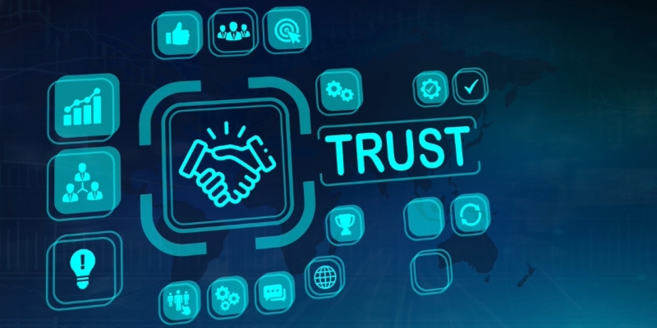 The word trust written in light blue on a dark blue background. It is surrounded by various icons including a thumbs up, a handshake and graphs.