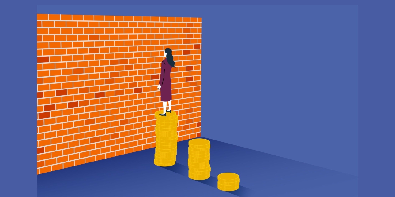 Illustration on a blue background showing a woman with white skin and long dark hair stood on top of three steps constructed from a stack of gold coins. She faces a large red brick wall