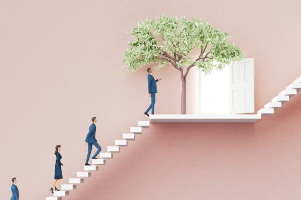 A side profile illustration on a pink background of business people walking up the first rung of a two rung staircase towards a green tree.