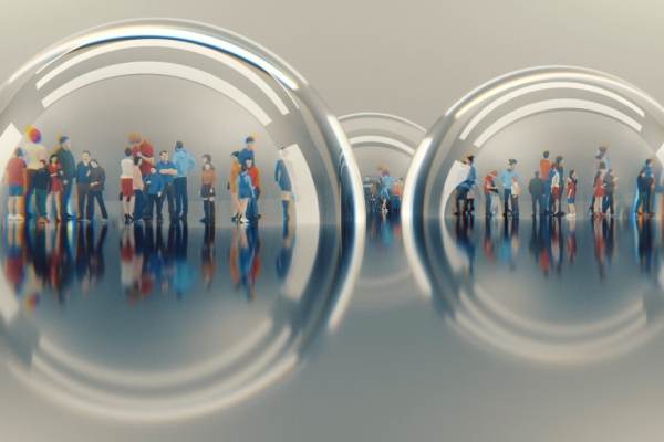 A selection of miniature figures under three glass domes on a grey background.