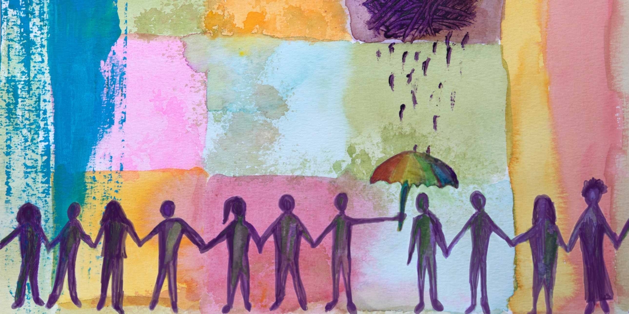 An illustration of 11 stick figures lined up holding hands. One person is being protected by a rain shower and dark cloud by a multi-coloured umbrella held by another. The background is a multi-coloured patchwork.