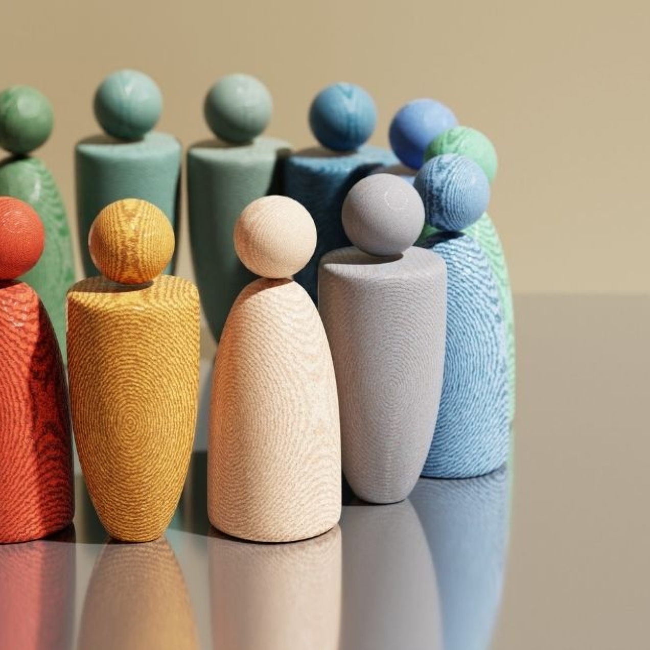 A circle of 15 wooden figures painted in different colours