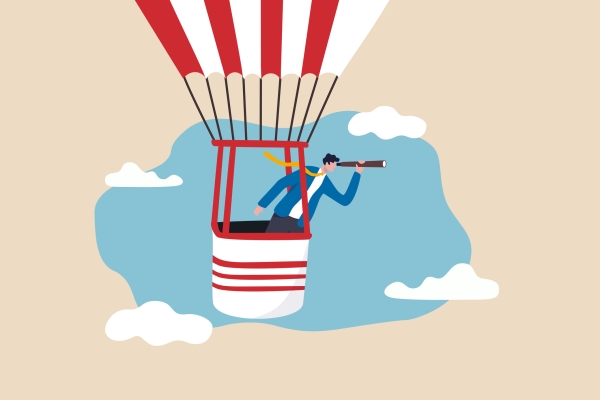 Illustration of a person in the basket of a hot air balloon looking through a telescope