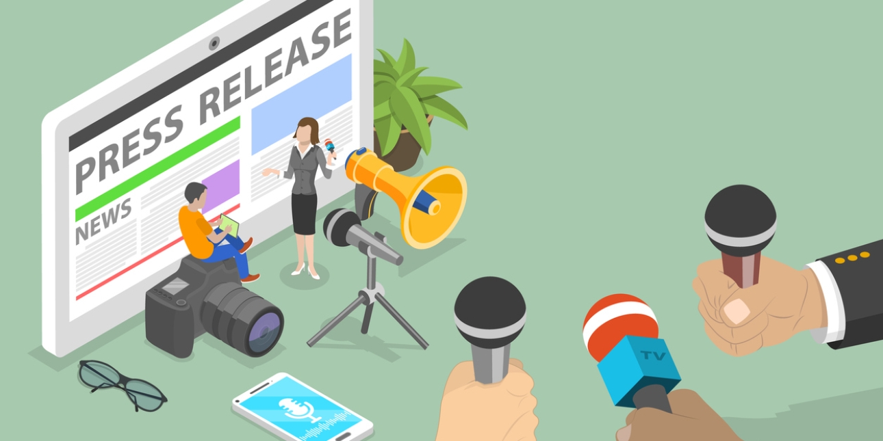 Illustration of a giant screen displaying the words press release and news. In front are a pair of spectacles, a man sat on an oversized camera and a woman reporter. There is also a an iPhone with a audio icon, a microphone, loudspeaker, and three ha