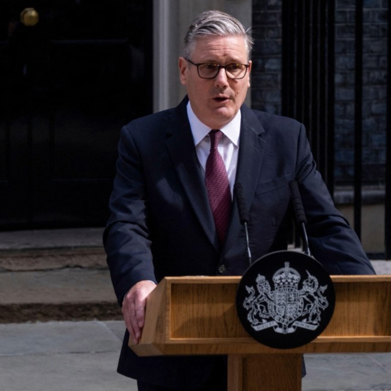 British prime minister Keir Starmer stood in front of a podium outside 10 Downing Street.