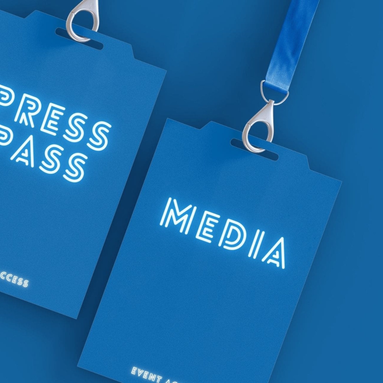 A computer generated image of two blue lanyards on a blue background with words press pass and media written on them