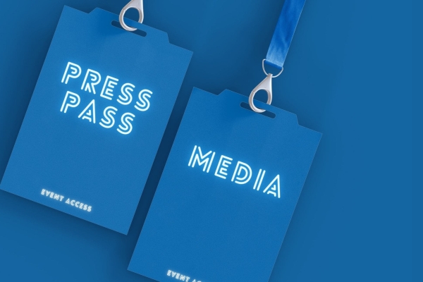 A computer generated image of two blue lanyards on a blue background with words press pass and media written on them