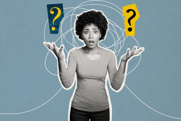 Collage on a blue background featuring a cut out black and white photograph of a woman looking astonished. She is flanked by two question mark and a squiggly line.