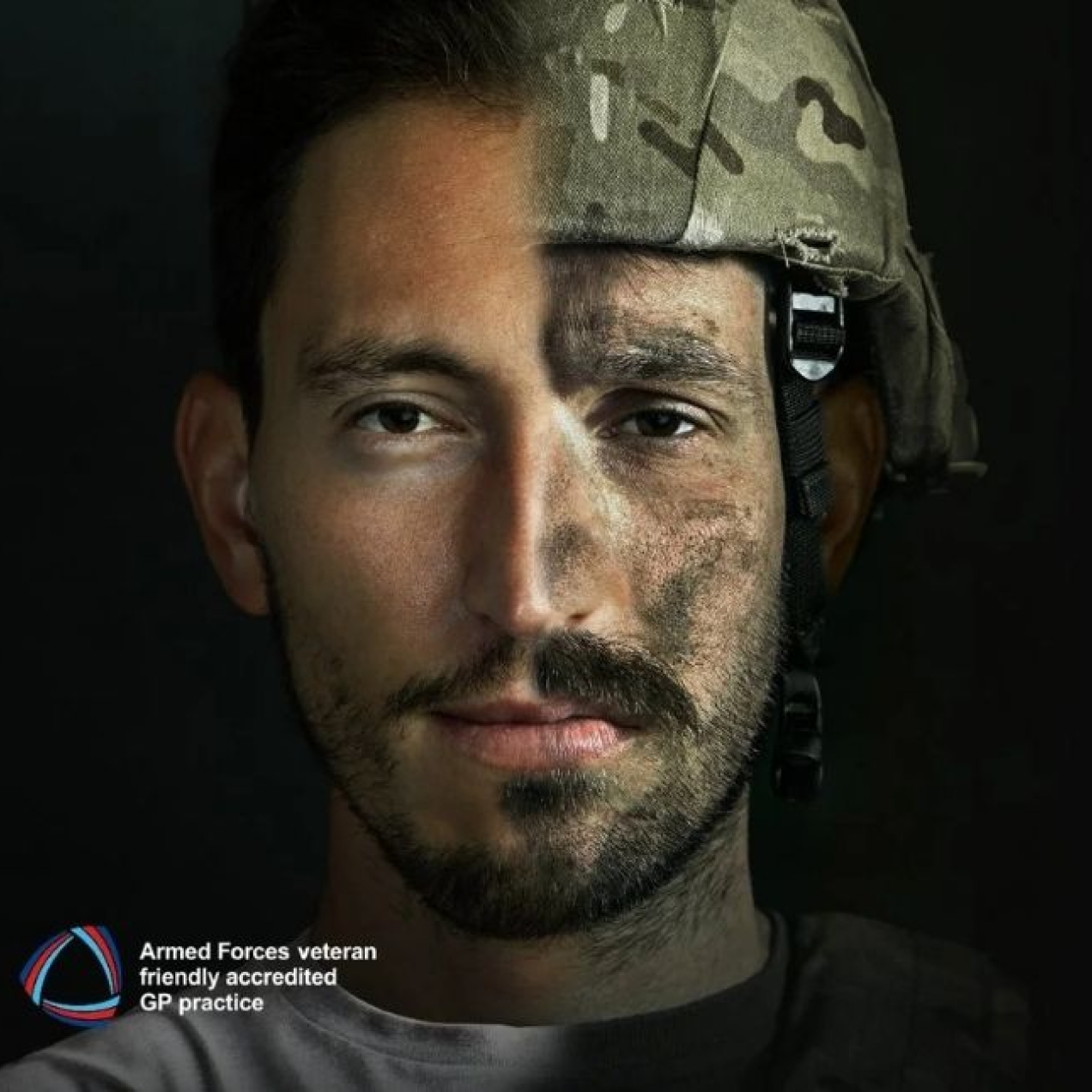 A campaign visual showing a digitised colour image of a white, male soldier's head and shoulders. His left side is civilian with short brown hair; his right side is in army helmet and uniform with camouflage paint on his cheek
