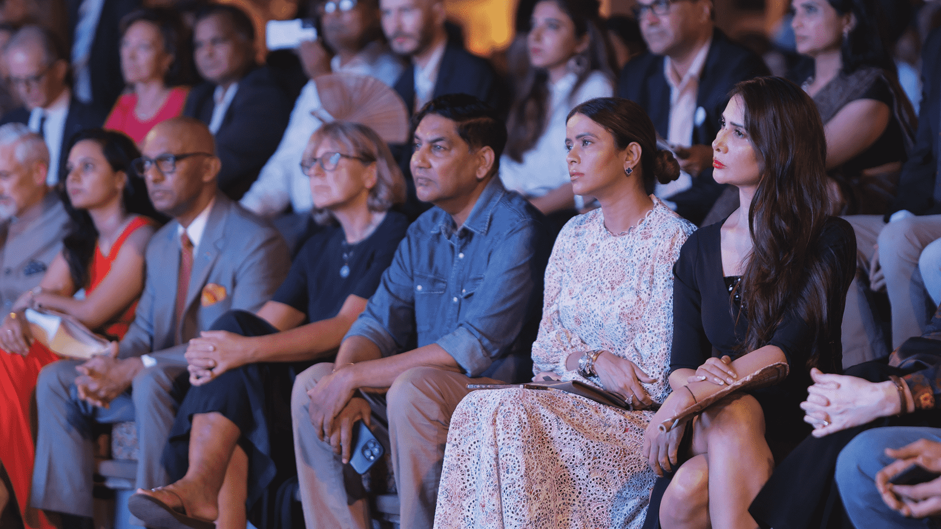 An audience of men and women