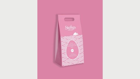A pink box with the Skellig Chocolate logo and an easter egg outline