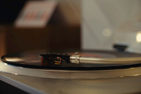 A still from the John Lewis advert showing a vinyl record on a record player