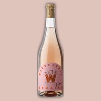 A rose wine bottle with pink label.